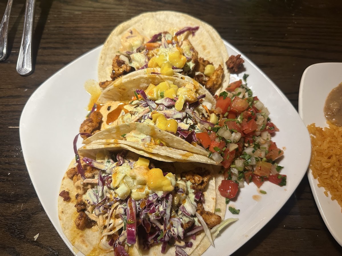 Street tacos with fresh slaw, pico de gallo, rice and beans at Rio in Madras